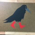 CROW-black on tan w red boots